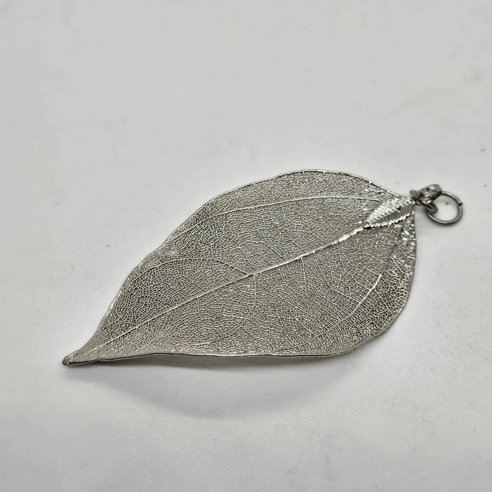 large silver tone leaf pendant